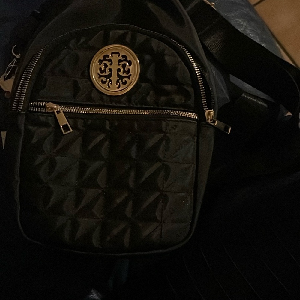 super cute tory burch style black quilted bag with gold accents